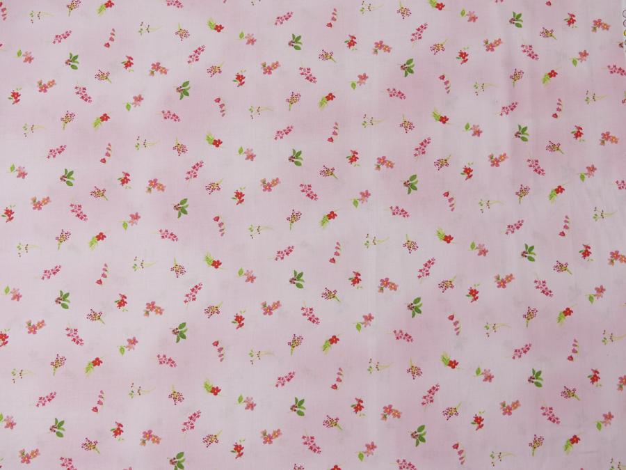 Patchworkstoff aus der Kollektion Flowershop von Clothworks rosa mit kleinen Blumen in pink rot